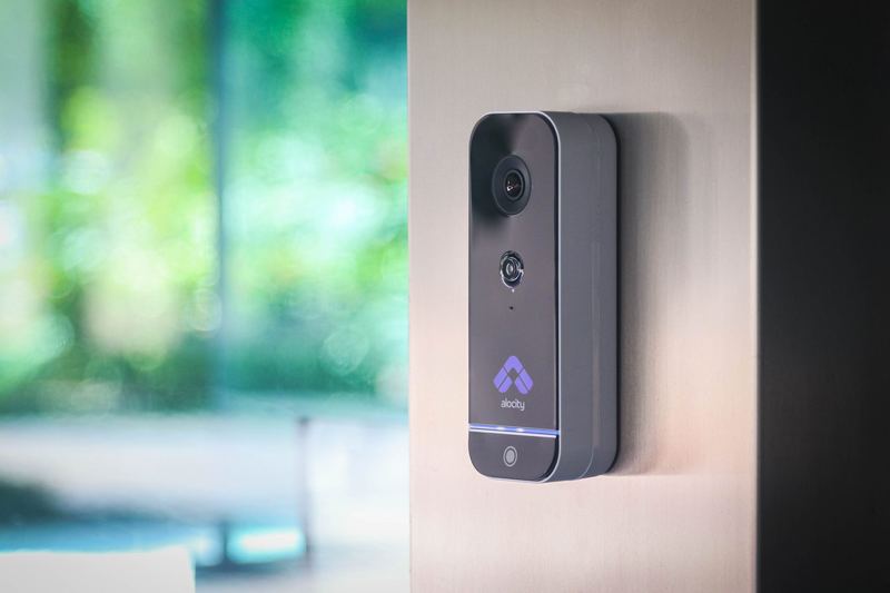 Alocity doorbell on door frame