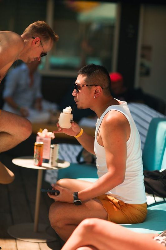 Guests at poolside lounge