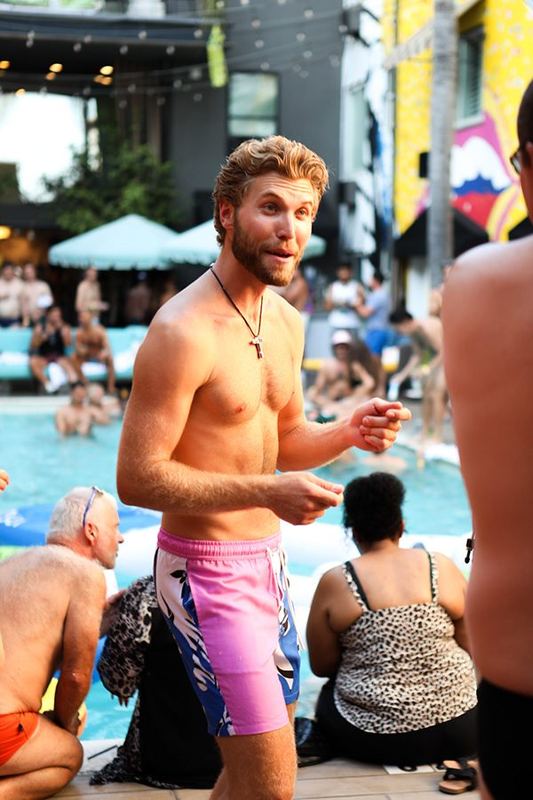 Pool party attendee dancing