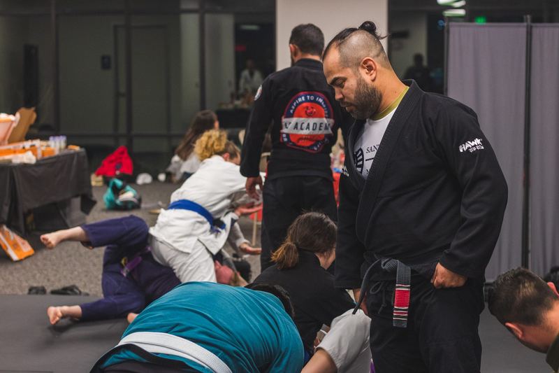 Coach helping student
